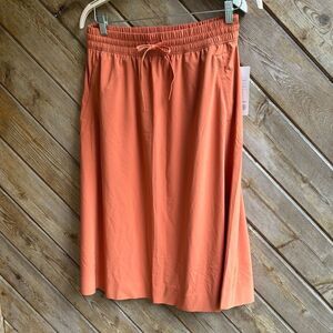 Athleta Coral Midi arrival travel Skirt size 12 new NWT
